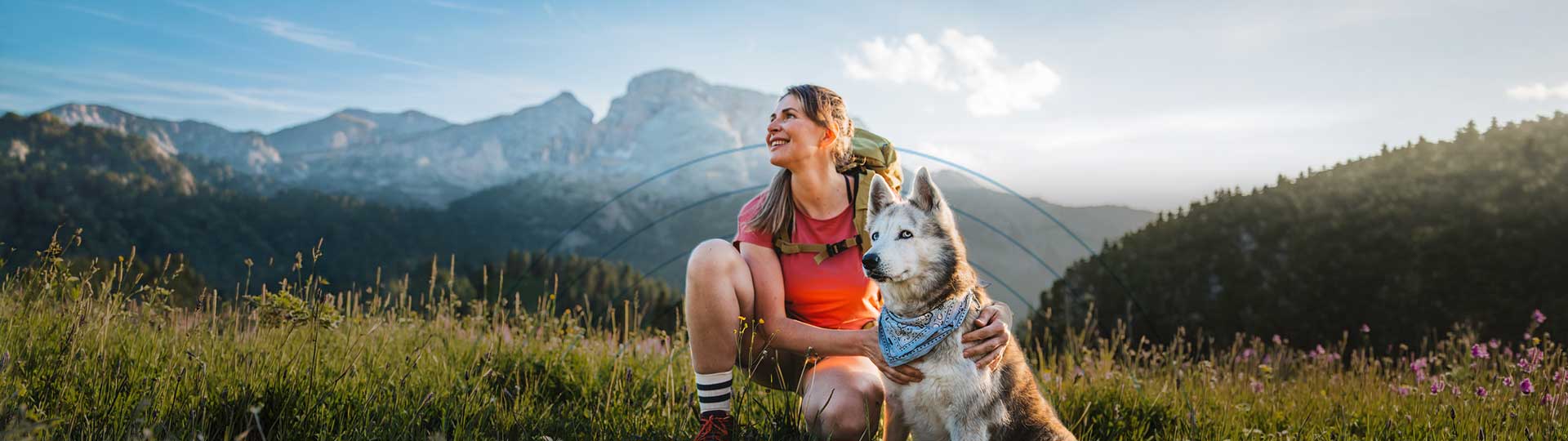 woman with a dog hiking